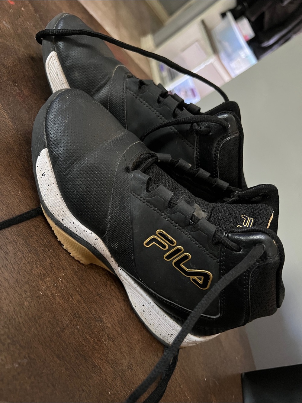 Fila Black Sneakers with Gold Logo and White Speckle Midsole. Boys size 3